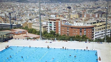 barcelona topless|Barcelona confirms women can swim topless in city pools .